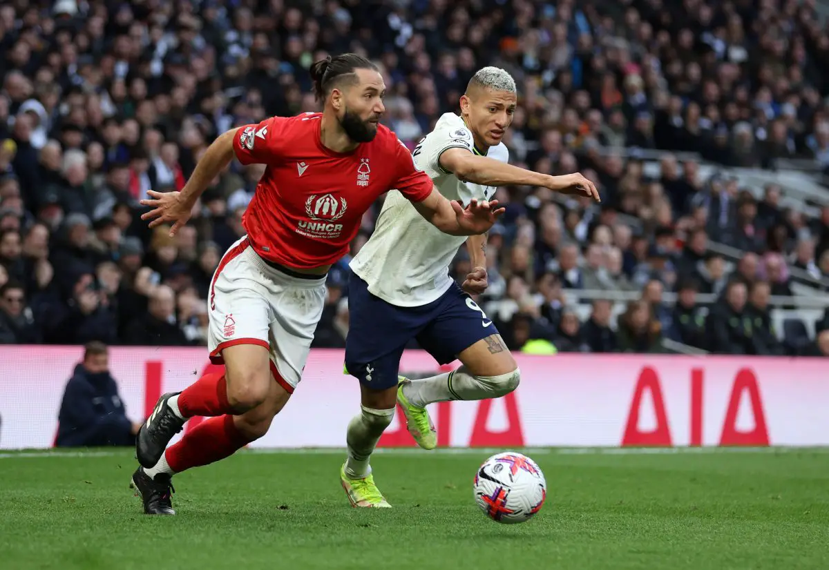 Richarlison of Tottenham Hotspur battles with Felipe of Nottingham Forest.