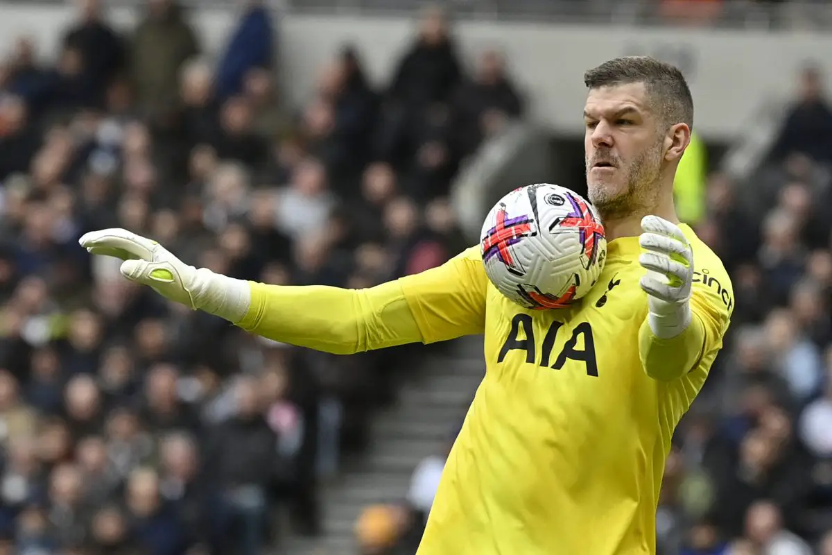 Tottenham Hotspur's English goalkeeper Fraser Forster controls the ball with his chest. (Photo by JUSTIN 