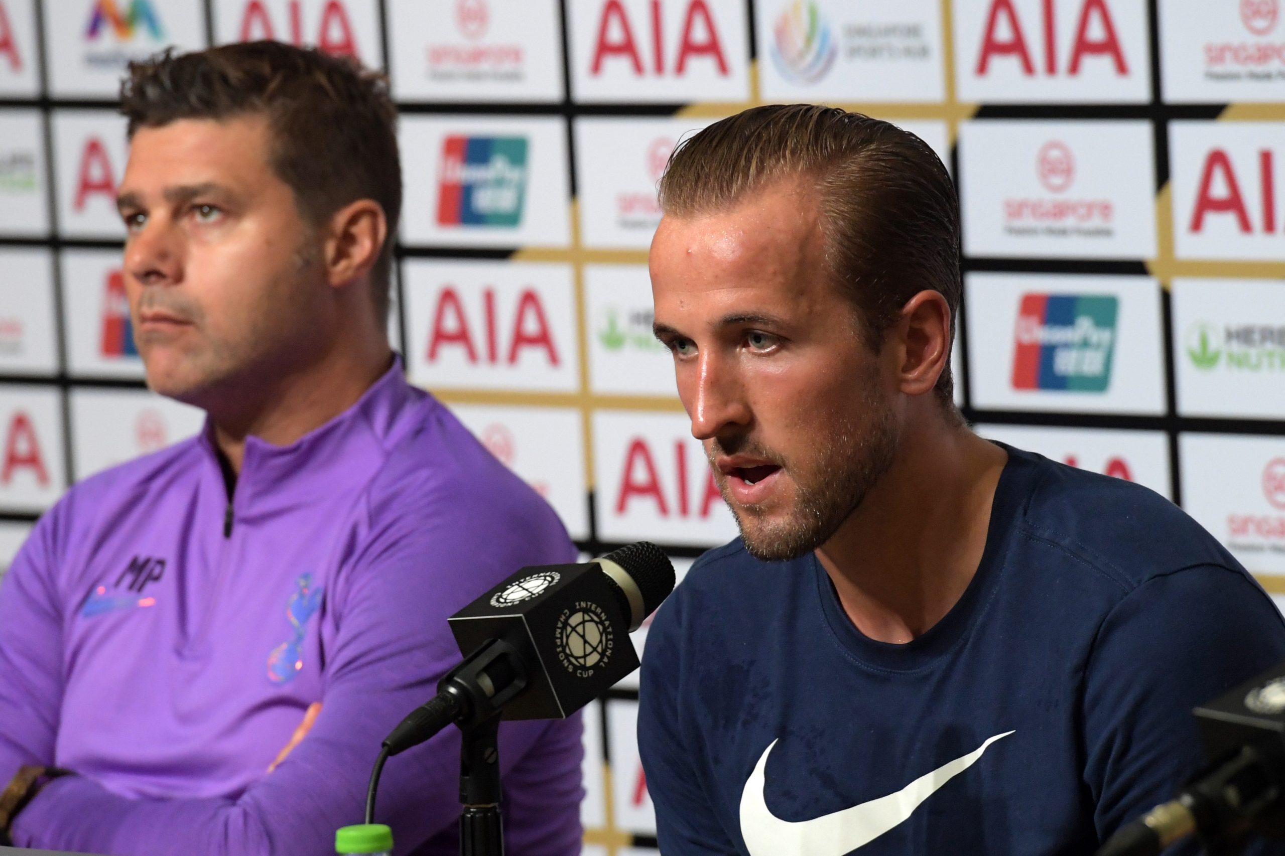 Tottenham Hotspur's Harry Kane and team manager Mauricio Pochettino attend a press conference - July 2019.