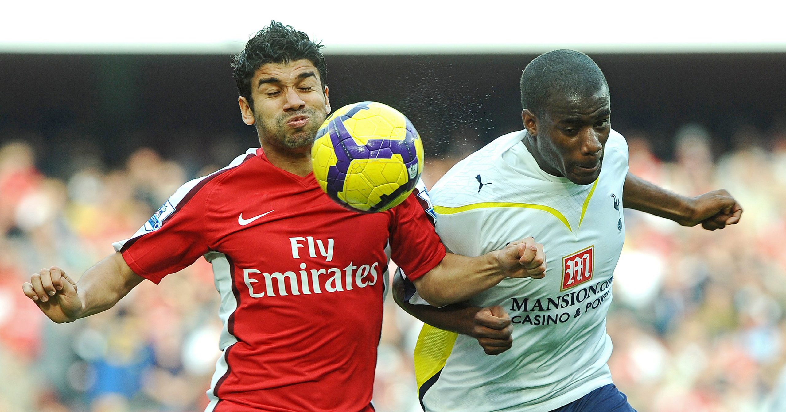 Arsenal's Brazilian-Croatian forward Eduardo vies with Tottenham's Sebastien Bassong - October 2009.