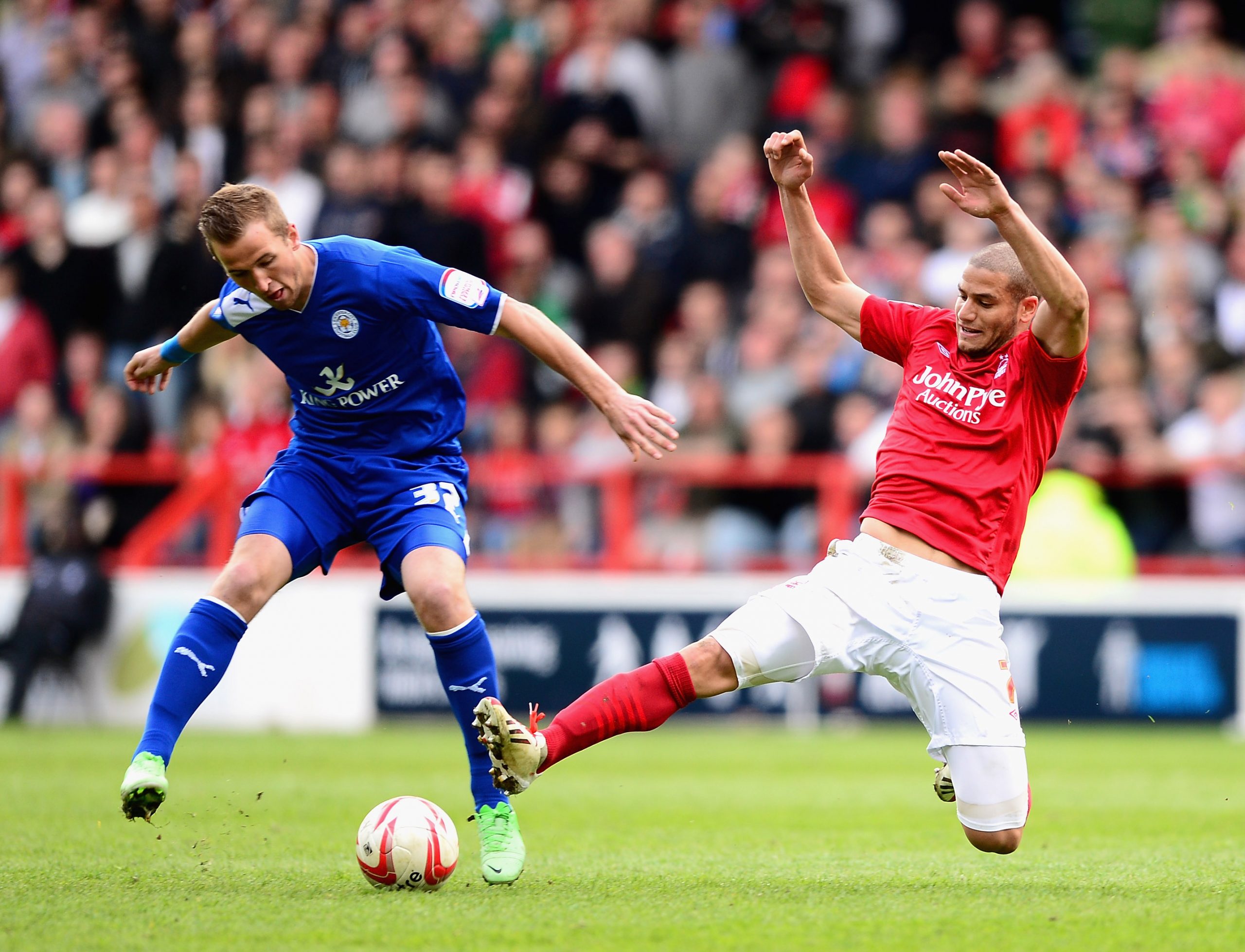 Harry Kane of Leicester City battles with Adlene Guedioura of Nottingham Forest in the Championship - May 2013.