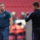 Mauricio Pochettino speaks to Tottenham Hotspur's Harry Kane during a training session in May 2019.