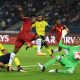 Colombia's goalkeeper Kevin Mier stops a shot from Ghana's Sadiq Ibrahim.