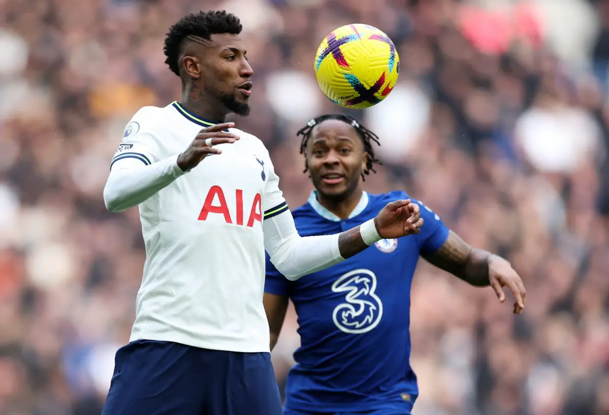 Emerson Royal of Tottenham Hotspur 
 controls the ball as Raheem Sterling of Chelsea watches in the background. (