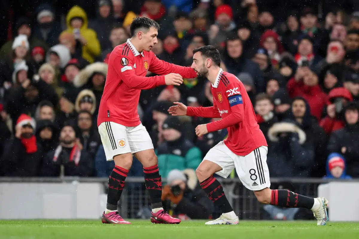 Bruno Fernandes of Manchester United celebrates with teammate Lisandro Martinez.