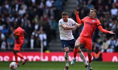 Brighton's English midfielder Solly March vies with Tottenham Hotspur's French defender Clement Lenglet.