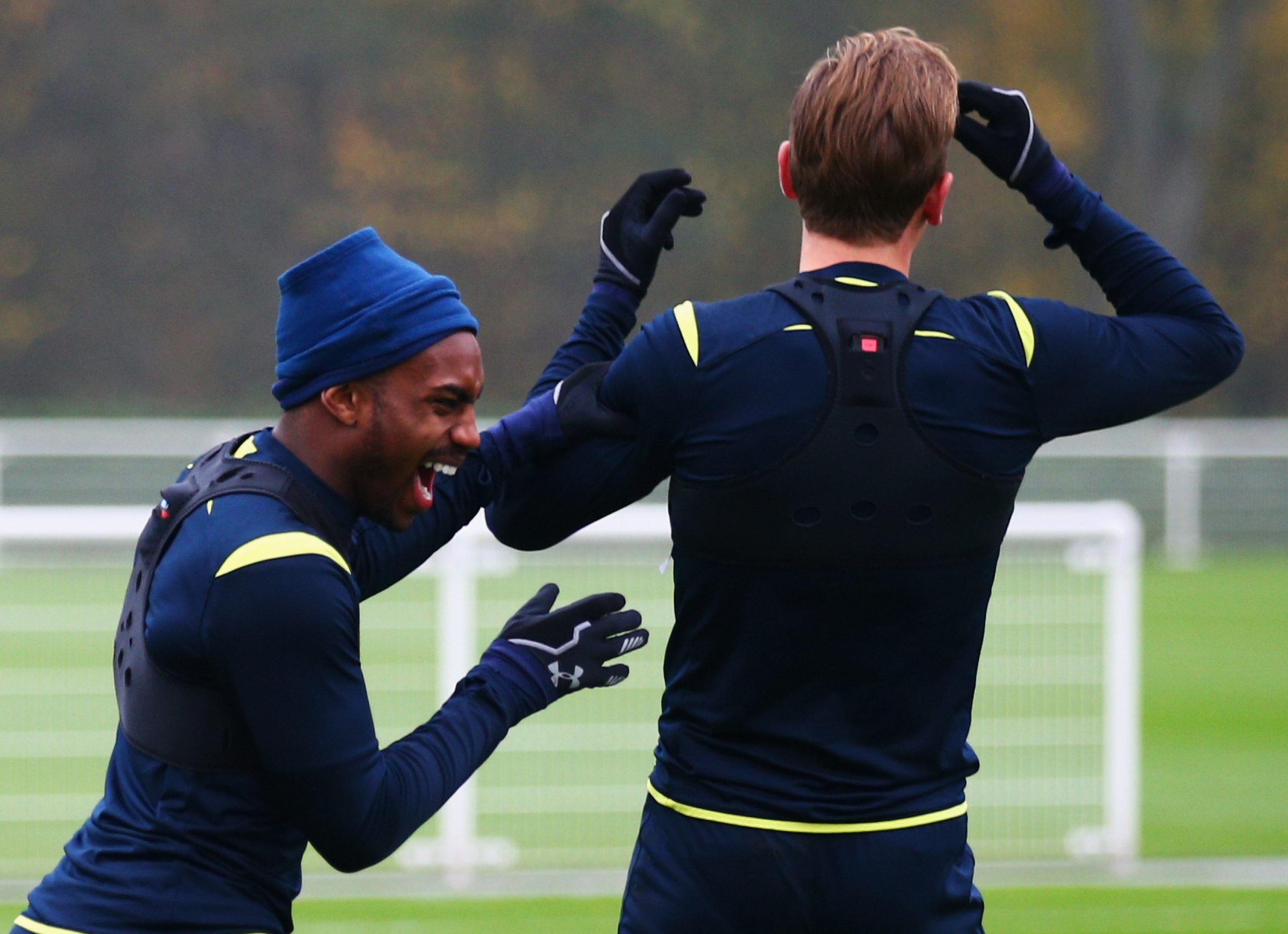 Danny Rose (L) jokes with Harry Kane during a Tottenham Hotspur FC training session - November 2014.