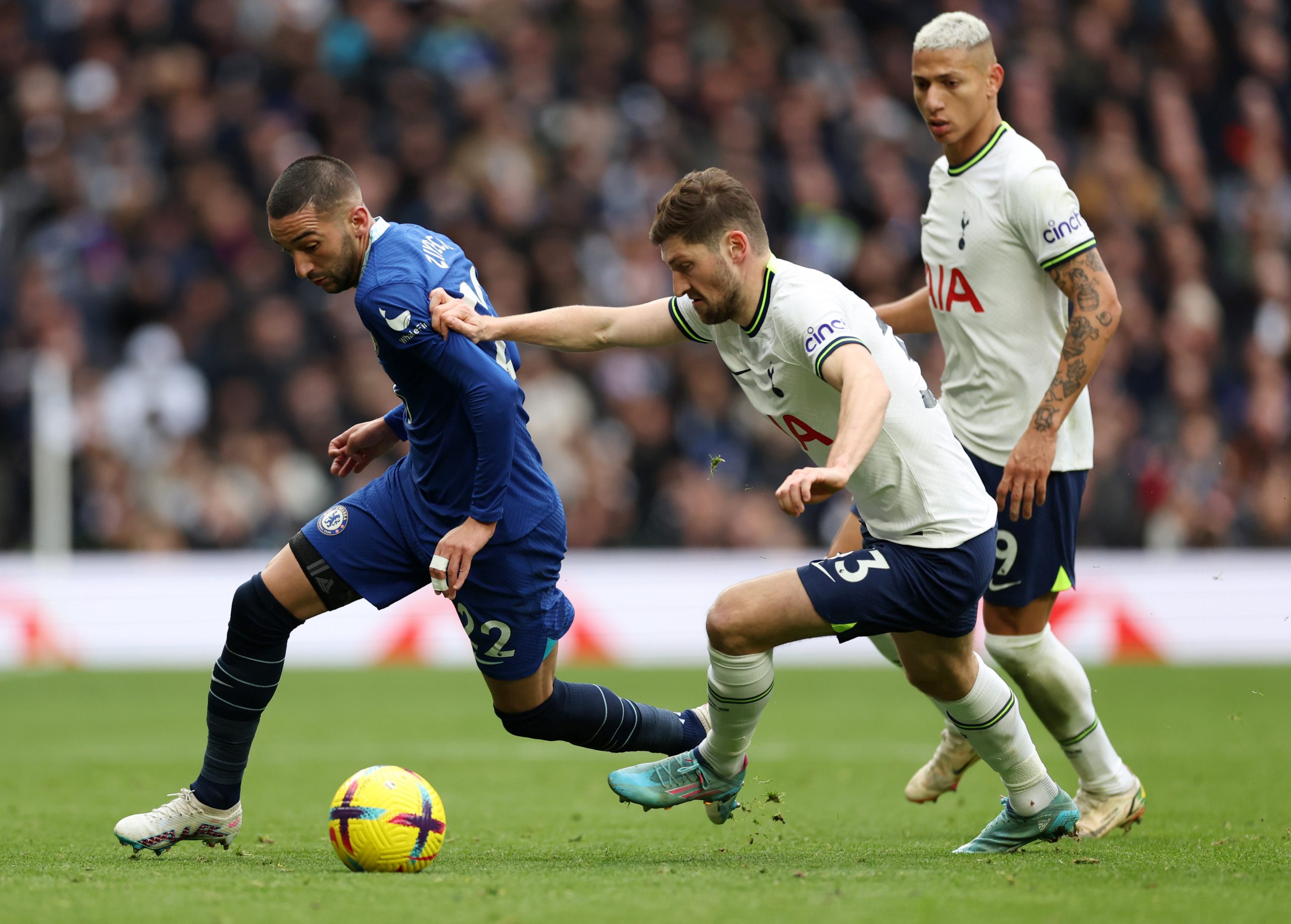 Hakim Ziyech of Chelsea is tackled by Ben Davies of Tottenham Hotspur. (Photo by Catherine Ivill/Getty Images)