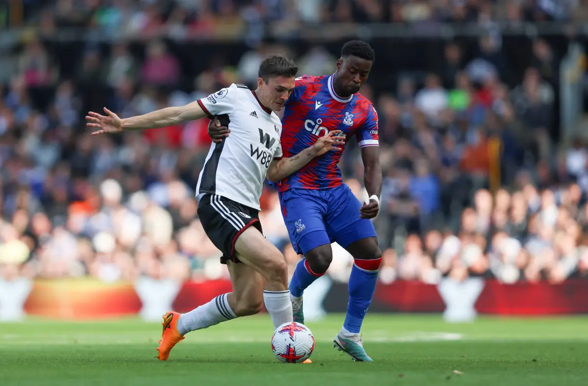 Joao Palhinha of Fulham battles for possession with Marc Guehi of Crystal Palace.