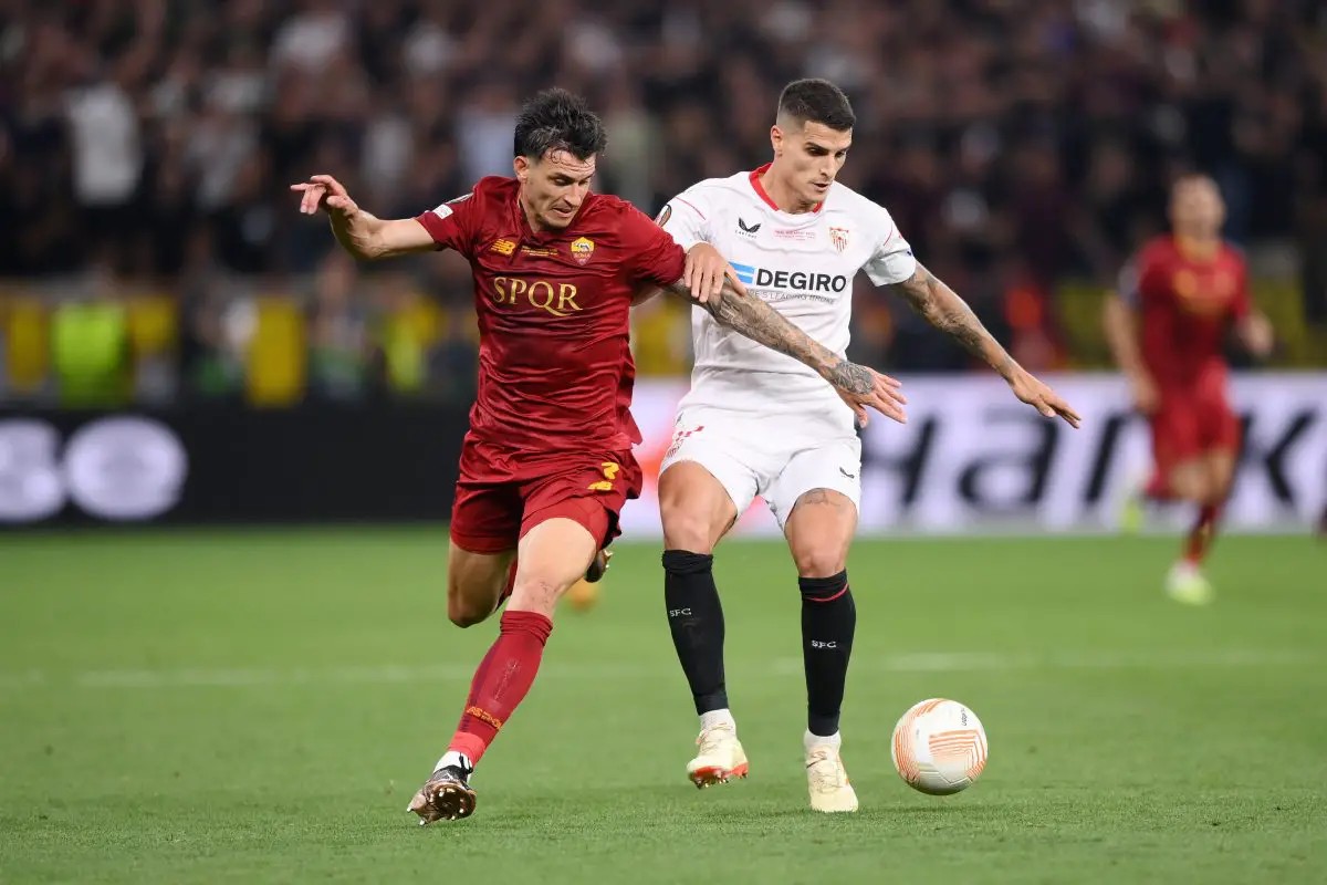 Roger Ibanez of AS Roma battles for possession with former Tottenham Hotspur winger Erik Lamela of Sevilla FC during the UEFA Europa League 2022/23 final. 