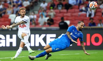 James Maddison of Tottenham Hotspur shoots the ball against Manuel Super of the Lion City Sailors.