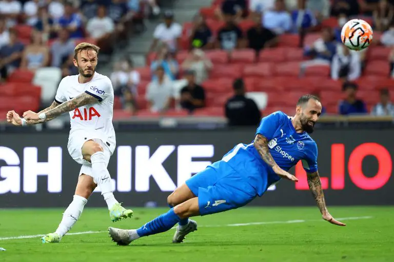 James Maddison of Tottenham Hotspur shoots the ball against Manuel Super of the Lion City Sailors.