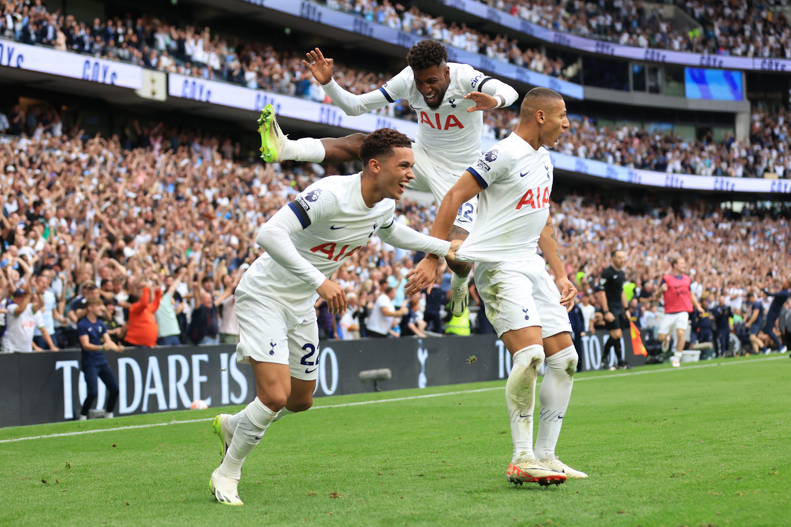 Brennan Johnson, Emerson Royal and Richarlison of Tottenham Hotspur celebrate a goal.