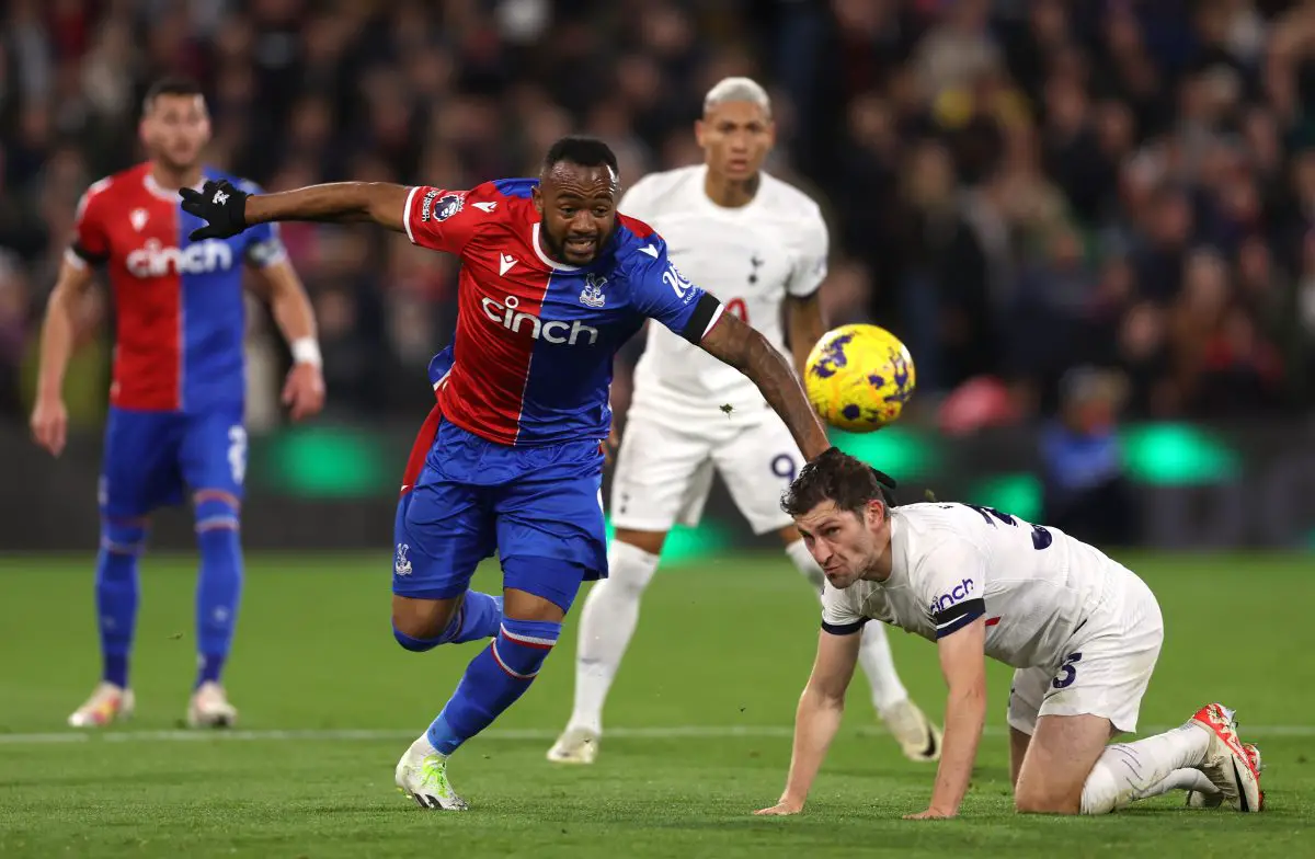 Jordan Ayew of Crystal Palace is tackled by Ben Davies of Tottenham Hotspur. (Photo by Alex Pantling/Getty Images)