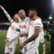 James Maddison (L), Richarlison (C) and Cristian Romero of Tottenham Hotspur celebrate after Joel Ward of Crystal Palace scored an own goal.