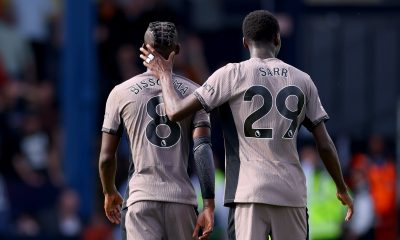 Yves Bissouma of Tottenham Hotspur is consoled by teammate Pape Matar Sarr as he leaves the pitch after being shown a red card against Luton Town. (Photo by Marc Atkins/Getty Images)