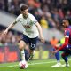 Ben Davies of Tottenham Hotspur runs with the ball whilst under pressure from Michael Olise of Crystal Palace. (Photo by Warren Little/Getty Images)