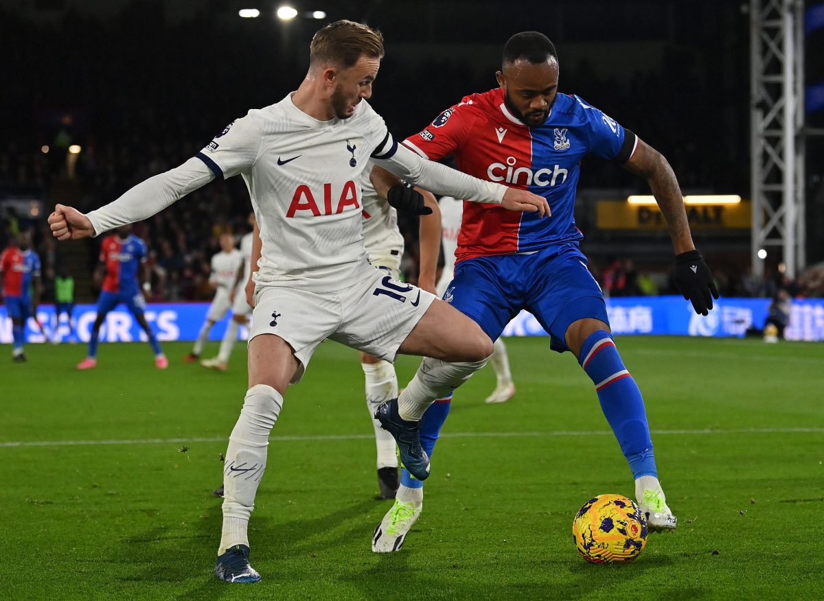 Tottenham Hotspur's English midfielder James Maddison (L) vies with Crystal Palace's French-born Ghanaian striker Jordan Ayew, (Photo by GLYN KIRK/AFP via Getty Images)