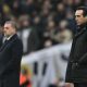 Tottenham Hotspur's Greek-Australian Head Coach Ange Postecoglou (L) and Aston Villa's Spanish head coach Unai Emery react. (Photo by BEN STANSALL/AFP via Getty Images)