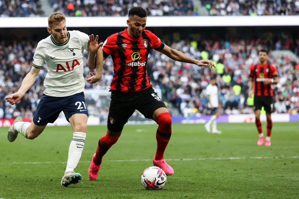 Tottenham Hotspur's Swedish midfielder Dejan Kulusevski (L) fights for the ball with Bournemouth's English defender Lloyd Kelly. (Photo by ADRIAN DENNIS/AFP via Getty Images)