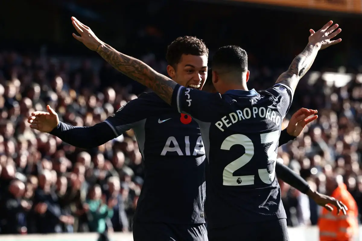 Tottenham Hotspur's Welsh striker Brennan Johnson (L) celebrates with Pedro Porro (R) after scoring. (Photo by DARREN STAPLES/AFP via Getty Images)