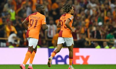 Galatasaray's French midfielder Tanguy Ndombele and French defender Sacha Boey celebrate.
