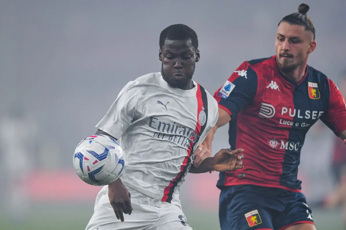 Yunus Musah of Milan (left) and Radu Dragusin of Genoa vie for the ball. (Photo by Getty Images/Getty Images)