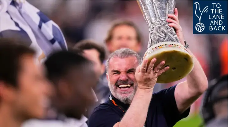 Tottenham boss Ange Postecoglou lifting the Europa League trophy.