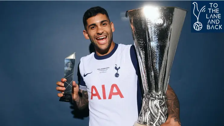 Tottenham star Cristian Romero with the Europa League trophy after a historic win.